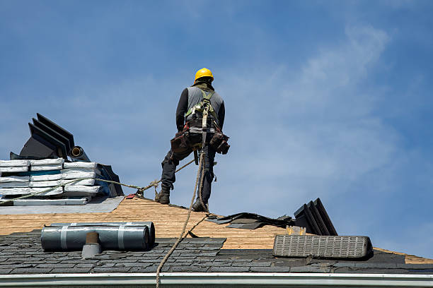 Professional Roof Replacement technician working in Cromwell, IN